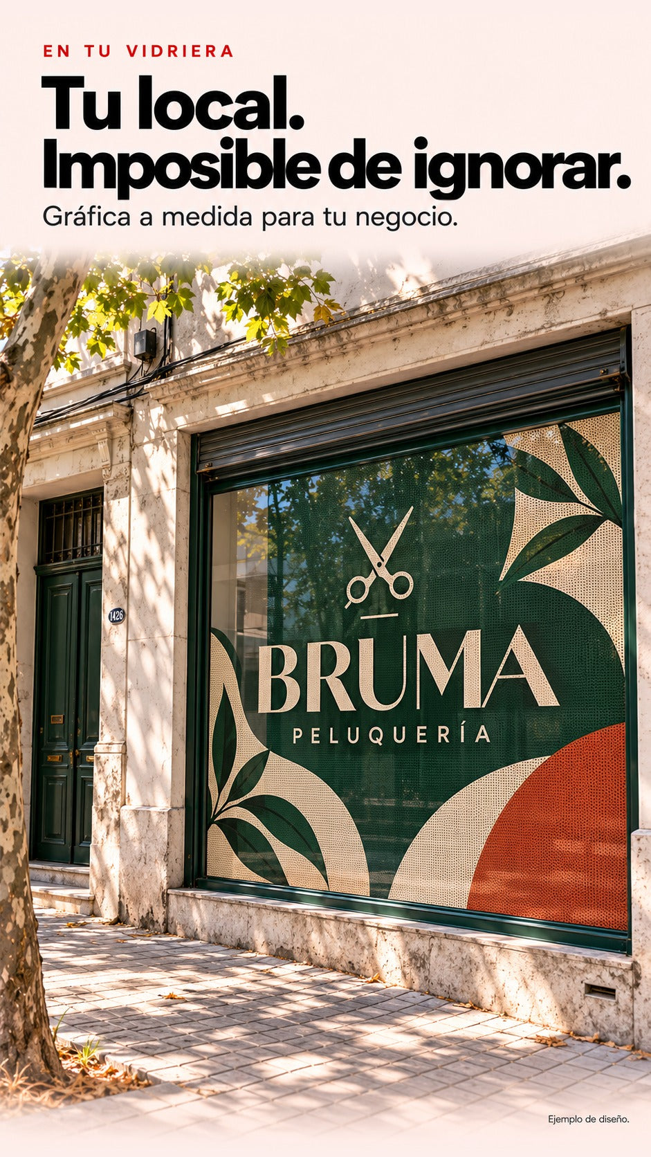 Peluquería ficticia Bruma en una calle de Montevideo, con vidriera cubierta por gráfica microperforada verde, crema y roja.